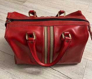 Valigia borsone da viaggio rosso in pelle vintage