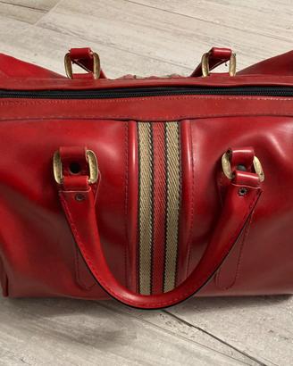 Valigia borsone da viaggio rosso in pelle vintage