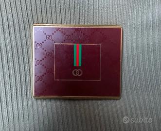 Portasigarette Gucci vintage metallo dorato.