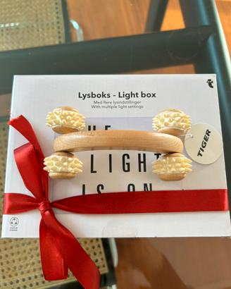 Tiger. Lavagna luminosa e roll grattino
