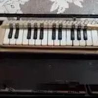 pianola con tuba a fiato,marca Bontempi 