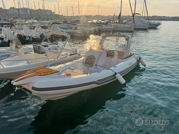 Stingher 22 con Suzuki 200 e carrello