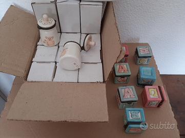 Assortimento bomboniere scatoline biberon dadi