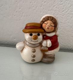 Thun bimba del Natale con pupazzo di neve