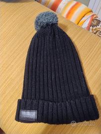 Cappello invernale nero con pon pon Sonny Bono