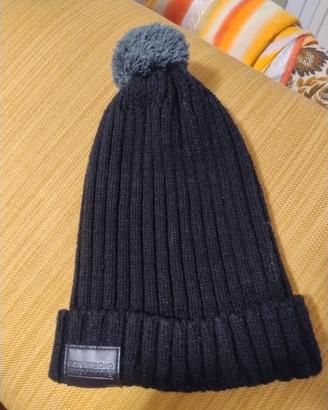 Cappello invernale nero con pon pon Sonny Bono