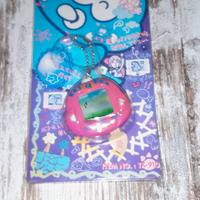 Rakuraku Dinokun Tamagotchi fucsia nuovo Giappone