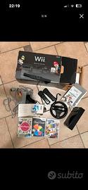 Wii Nintedo "Mario Kart Wii Pack" + 3 giochi.