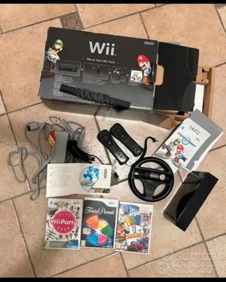 Wii Nintedo "Mario Kart Wii Pack" + 3 giochi.