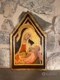 Opera raffigurante la Madonna con Bambino