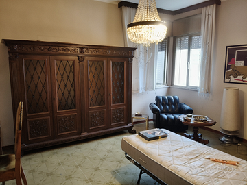 Camera singola grande con salotto