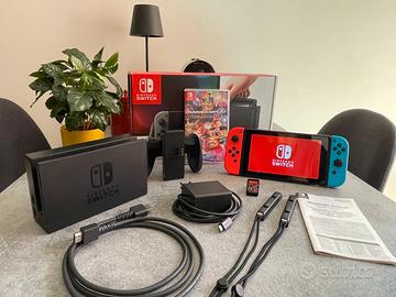 Nintendo Switch + Mario Kart 8 Deluxe + Cover