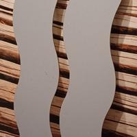 Specchio ondulato a filo muro