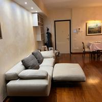 Divano flexform wing con pouf