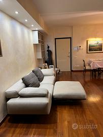 Divano flexform wing con pouf