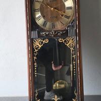 Orologio a pendolo da muro 