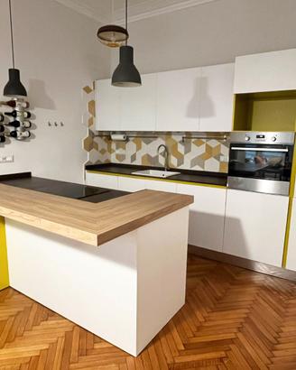 Cucina COPAT, grande penisola, top Dekton e frigo