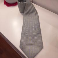 Cravatta verde acqua con quadratini blu