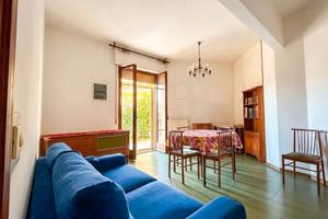 Appartamento con giardino e posto auto