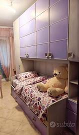 Camera completa con armadio a sei ante e materassi