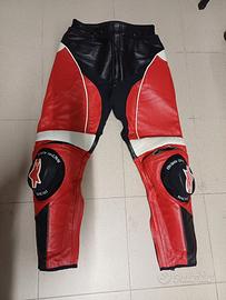 Pantaloni moto Alpinestars rossi e neri