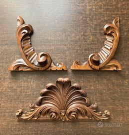 Fregi intagliati in legno