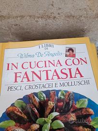 collezione libri in cucina con fantasia di Wilma 