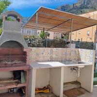 Casa con giardino