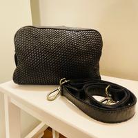 Borsa intrecciata a tracolla in pelle