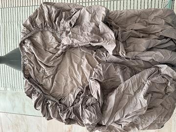 Copriletto una piazza con angoli elastici