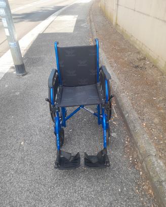 Carrozzina - Sedia a Rotelle