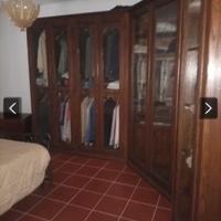 Cabina armadio angolare in legno di noce