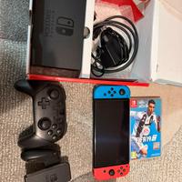 Nintendo switch oled con giochi e accessori