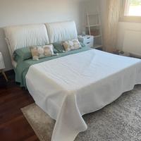 Letto matrimoniale con doghe in legno