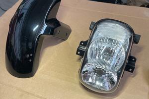 Faro e parafango anteriore