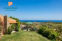 chia-villetta-con-giardino-e-vista-sul-mare