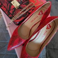 Scarpe pitonate e borsa pitonata