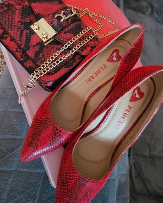 Scarpe pitonate e borsa pitonata