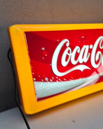 insegna coca cola