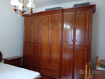 Camera da letto completa in legno massello