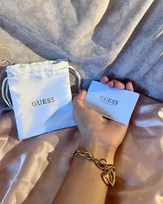 Bracciale Guess originale dorato con charm a cuore