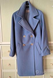 Glamour e deciso, il cappotto doppiopetto Versani