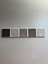 Listello in ceramica 5x25 resina grigio