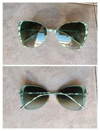 Occhiali da sole camouflage verde cat-eye
NUOVI in