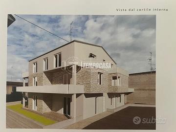 TRILOCALE NUOVO PIANO TERRA CON GIARDINO E POSTI A