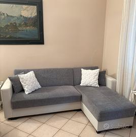 Divano letto con penisola e contenitore