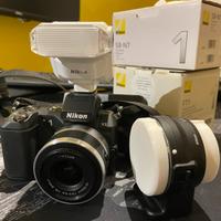 Nikon V2 con ottica 10-30 e custodia. Perfetta
