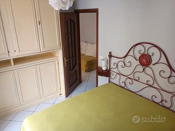 Casa vacanza bilocale in centro con posto auto