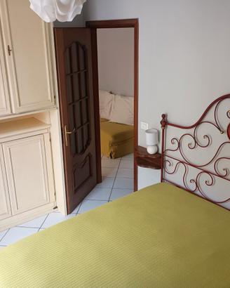 Casa vacanza bilocale in centro con posto auto