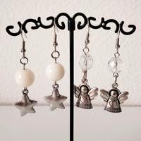Coppia di orecchini stella e angelo